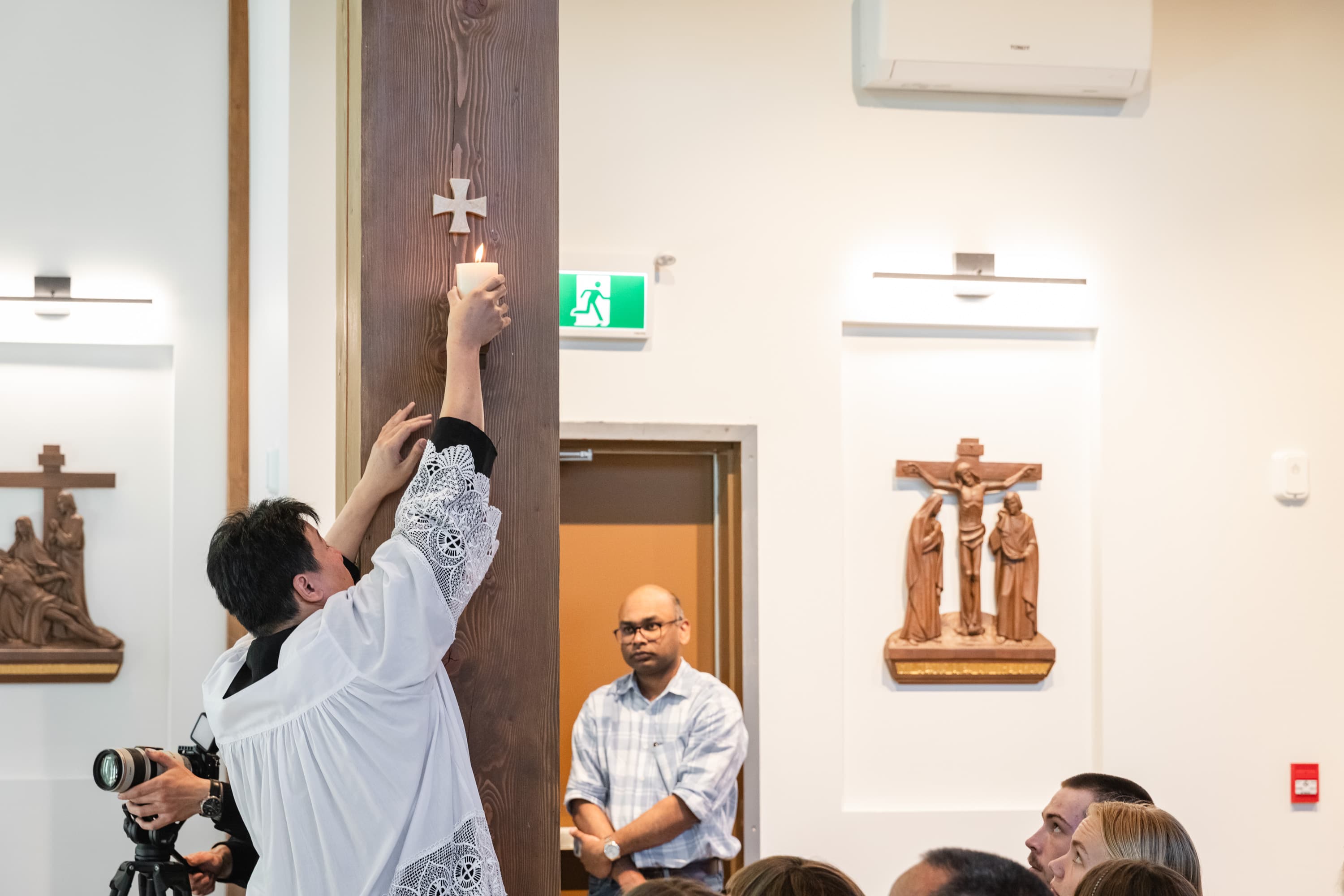 Lighting the consecration candle